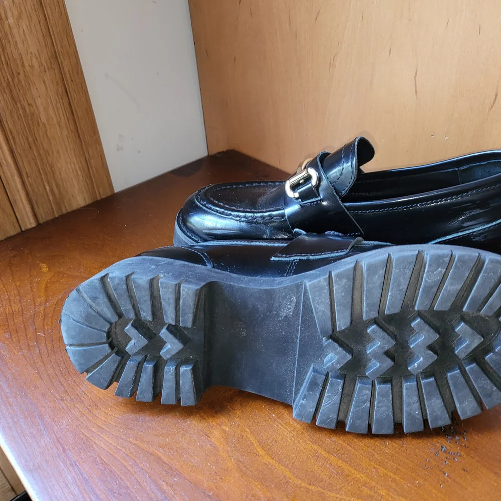 Steve Madden Black and Gold Leather Flats with Chunky Sole